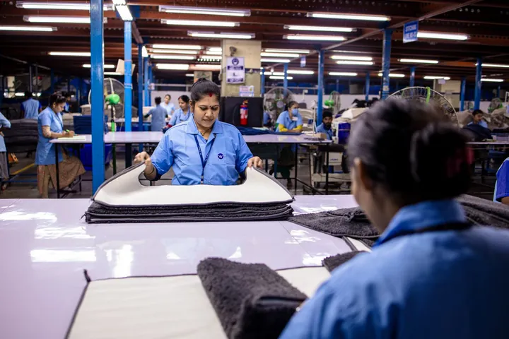 Workers on a factory production line