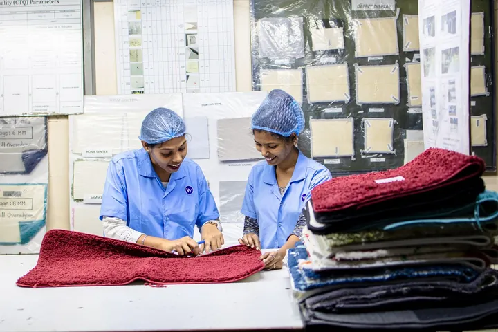 Workers inspecting finished products